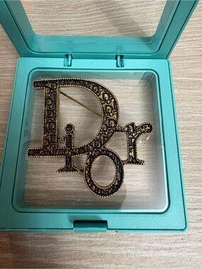 Preloved antique gold tone Dior brooch excellent condition